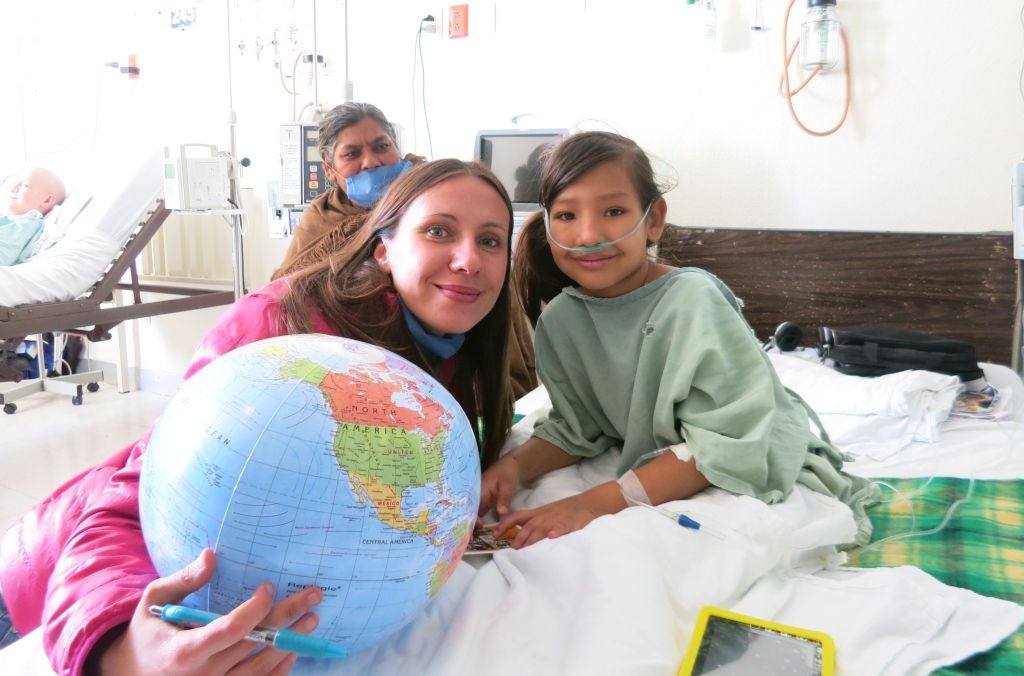 Women Who Ride: Anna Grechishkina visiting kids at a hospital in Mexico