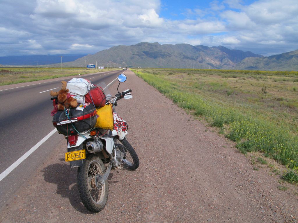 Motorcycling in South America: Dirt bike in Mendoza, Argentina, with a panoramic view ahead
