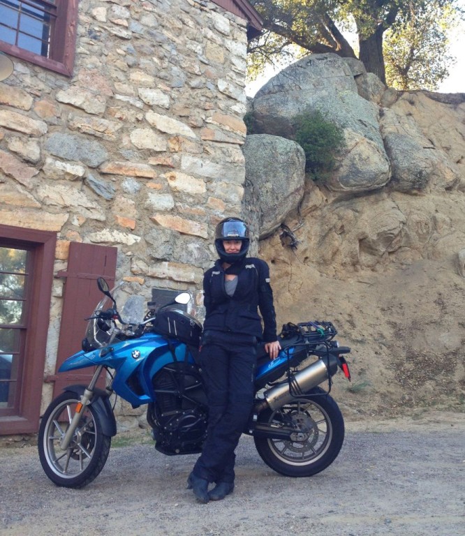 Women Who Ride Motorcycles: Cristi Farrell in Eastern San Diego County with her blue 2009 BMW F650GS. She is all geared up.