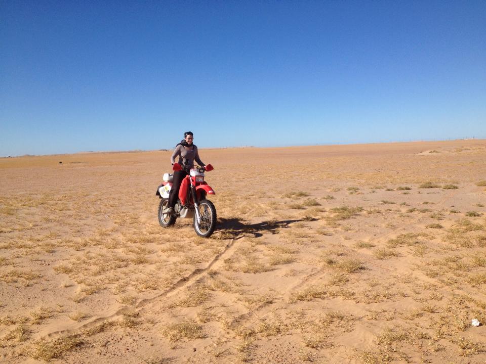 Women Who Ride: Fatima Ropero riding the Hungarian's bike in Mauritania
