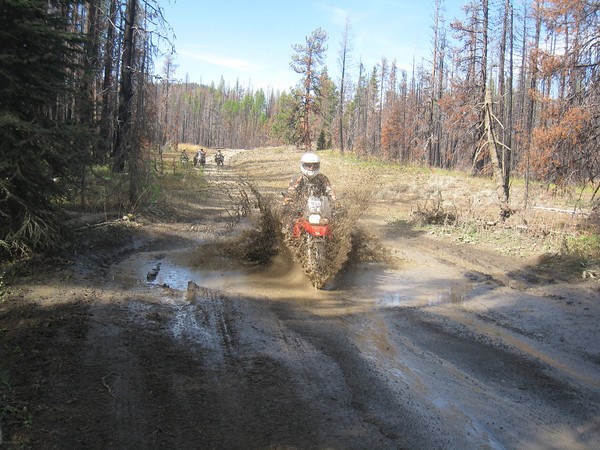 Women Who Ride: Gaila has fun in the mud on the Washington Backcountry Discovery Route!