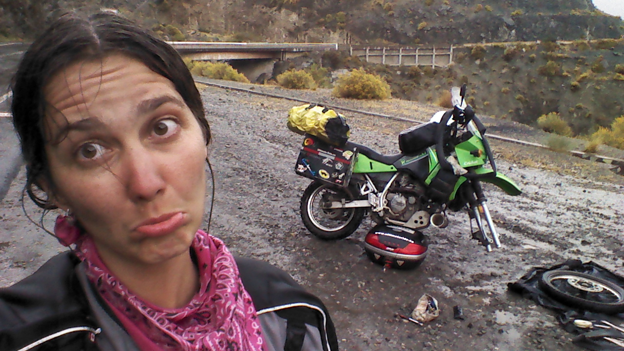 Women Who Ride: Jayne Davidson fixing a flat tire