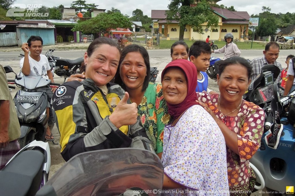 Women Who Ride: Lisa Thomas with new friends in Java