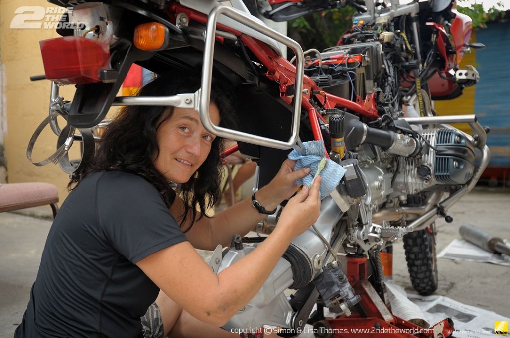 Women Who Ride: Lisa Thomas wrenching on her bike