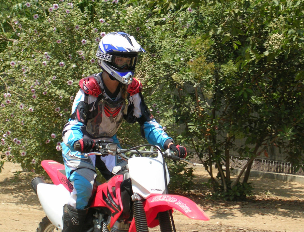 Women Who Ride: Leah Van Holten riding her dirt bike at the age of 12.