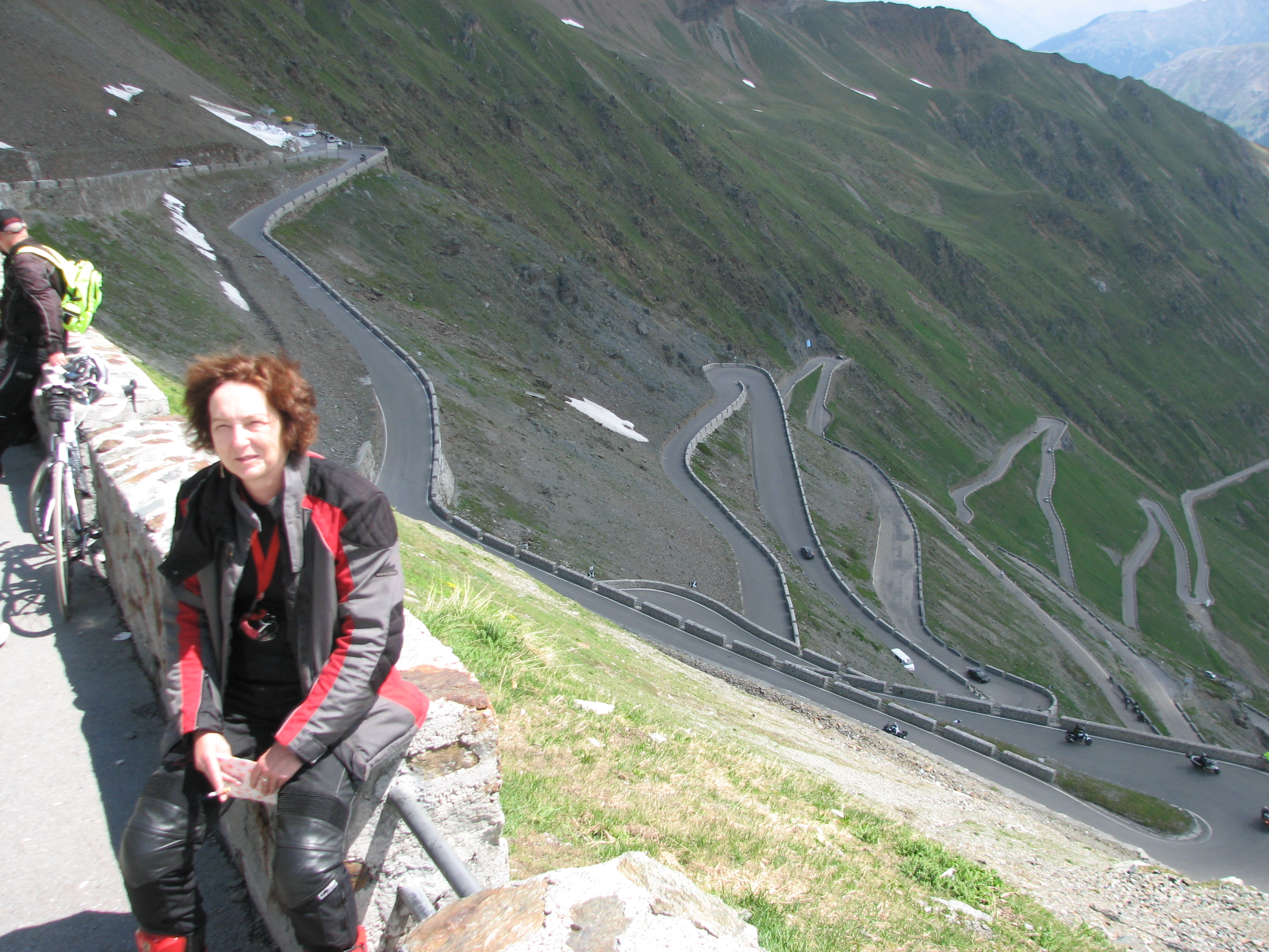 Women Who Ride: Marina Sienkiewicz on top of Stelvio Pass, Austria
