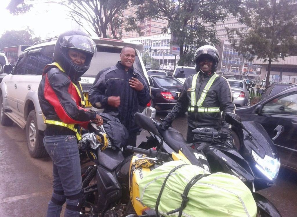 Some guys escorting us out of town during the Narok ride