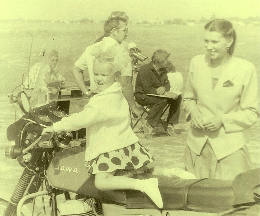 Women Who Ride: Victoria Dorozhko as a child, sitting on a Jawa motorcycle