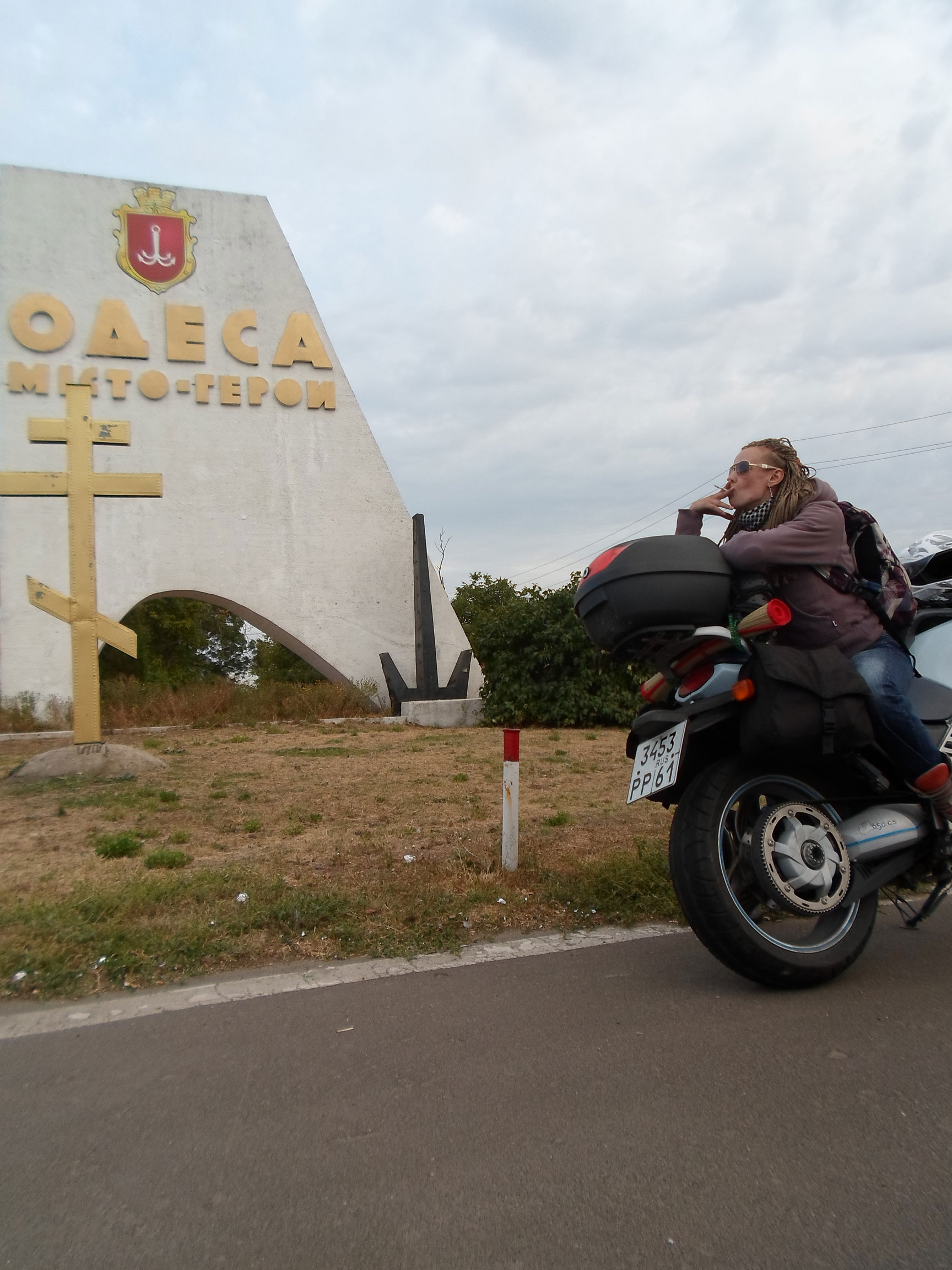 Women Who Ride: Victoria Dorozhko stopped on the road, smoking a cigarette