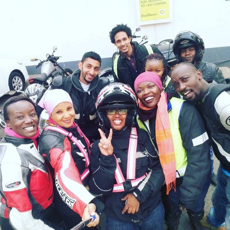 Kenyan motorcyclists posing for a selfie
